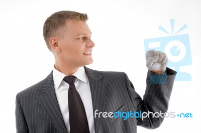 Businessman Looking His Fist Stock Photo