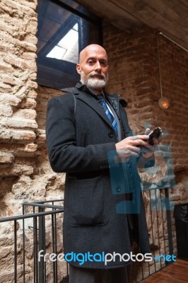 Businessman Looking In Front Of Camera Stock Photo