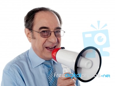 Businessman Making Announcement Stock Photo