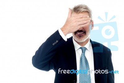 Businessman Making The See No Gesture Stock Photo