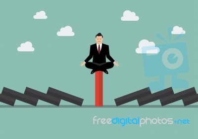 Businessman Meditating On Unique Red Domino Tile Among Falling B… Stock Image