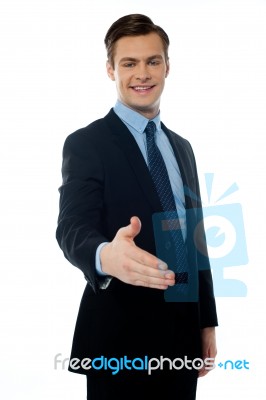 Businessman Offering Handshake Stock Photo