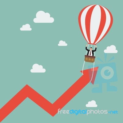 Businessman On Balloon Pull Arrow Graph Up Stock Image