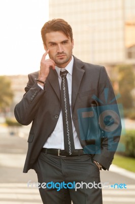 Businessman On The Street Stock Photo