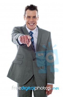 Businessman Pointing At You Stock Photo