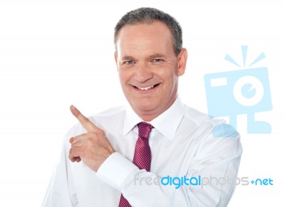 Businessman Pointing backward Stock Photo