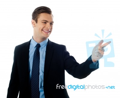 Businessman Pointing Right Stock Photo