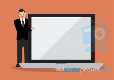 Businessman Pointing To The Screen Of A Laptop Stock Image