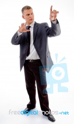 Businessman Pointing Up Stock Photo