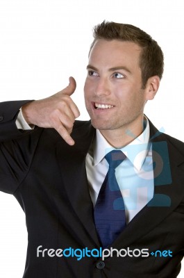 Businessman Posing Calling Hand Gesture Stock Photo