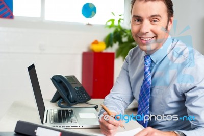 Businessman Preparing Reports Stock Photo