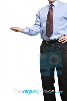 Businessman Presenting Something On His Empty Palm Stock Photo