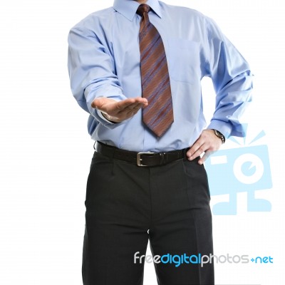 Businessman Presenting Something On His Empty Palm Stock Photo