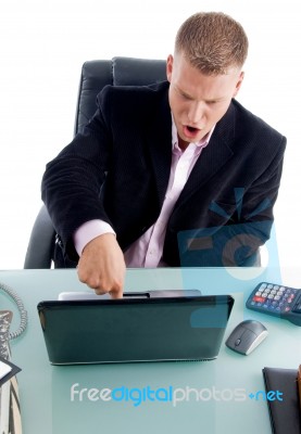 Businessman Pressing Laptop Key Stock Photo