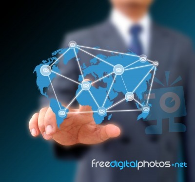 Businessman Pressing Messaging Stock Photo