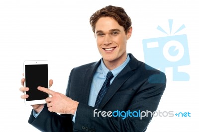 Businessman Promoting Newly Launched Tablet Stock Photo