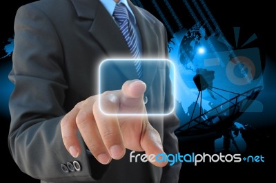 Businessman Pushing Button Stock Photo