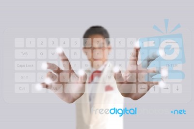 Businessman Pushing Keyboard Stock Photo