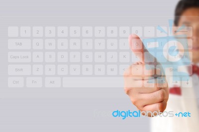 Businessman Pushing Keyboard Stock Photo