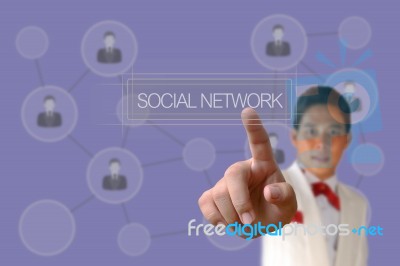 Businessman Pushing Social Network Button Stock Photo