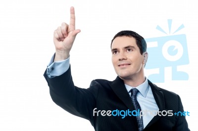 Businessman Pushing Tactile Button Stock Photo