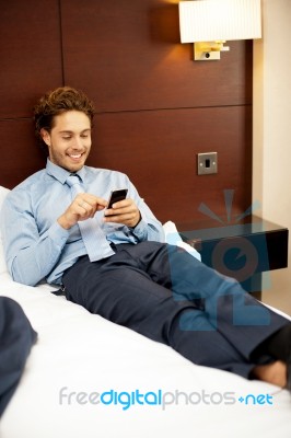 Businessman Reading Sms Stock Photo