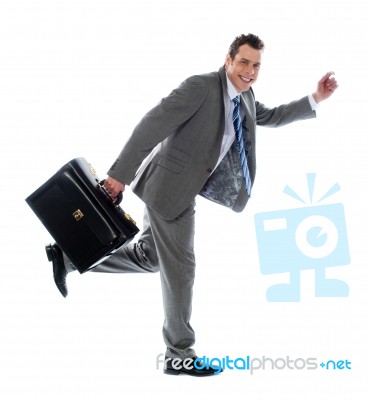 Businessman Running Away Stock Photo