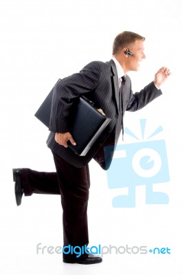 Businessman Running With Briefcase Stock Photo