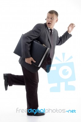 Businessman Running With Briefcase Stock Photo