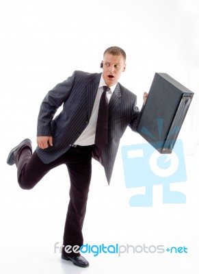 Businessman Running With Briefcase Stock Photo