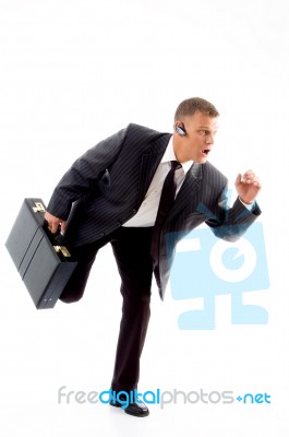 Businessman Running With Briefcase Stock Photo