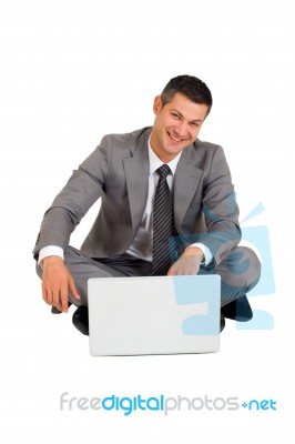 Businessman Sat With Laptop Stock Photo