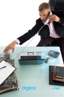 Businessman Shouting On Phone Stock Photo