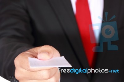 Businessman Showing Blank Card Stock Photo