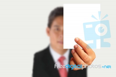 Businessman Showing Blank Paper Stock Photo