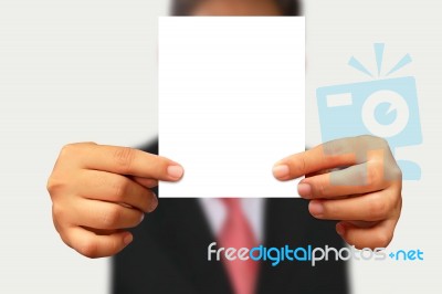 Businessman Showing Blank Paper Stock Photo