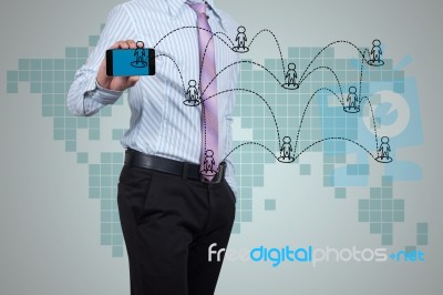 Businessman Showing Cellphone Stock Photo