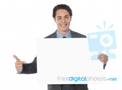 Businessman Showing Empty Board Stock Photo