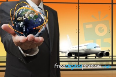 Businessman Showing Globe Stock Photo