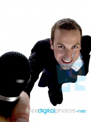 Businessman Showing His Mic Stock Photo