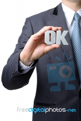 Businessman Showing Ok Sign Stock Photo