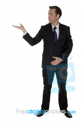 Businessman Showing Open Palm Stock Photo