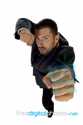 Businessman Showing Punch Stock Photo