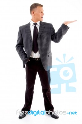 Businessman Showing Something Stock Photo