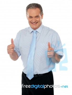 Businessman Showing Thumbs Up Stock Photo