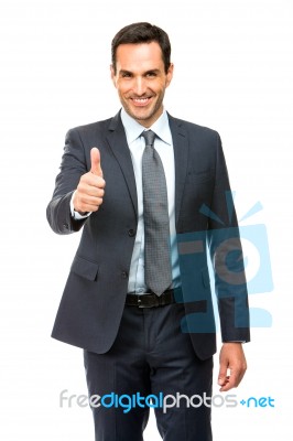 Businessman Smiling Thumb Up Stock Photo