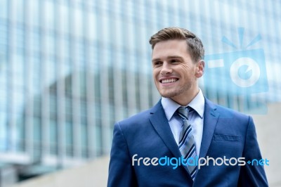 Businessman Standing Outside Modern Building Stock Photo