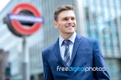 Businessman Standing Outside Modern Building Stock Photo