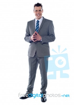 Businessman steepling Stock Photo