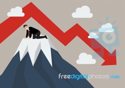 Businessman Stuck On A Top Hill Stock Image